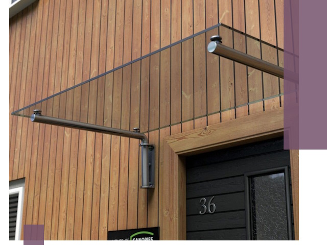 Стеклянные козырьки на входы и фасады в Сланцах